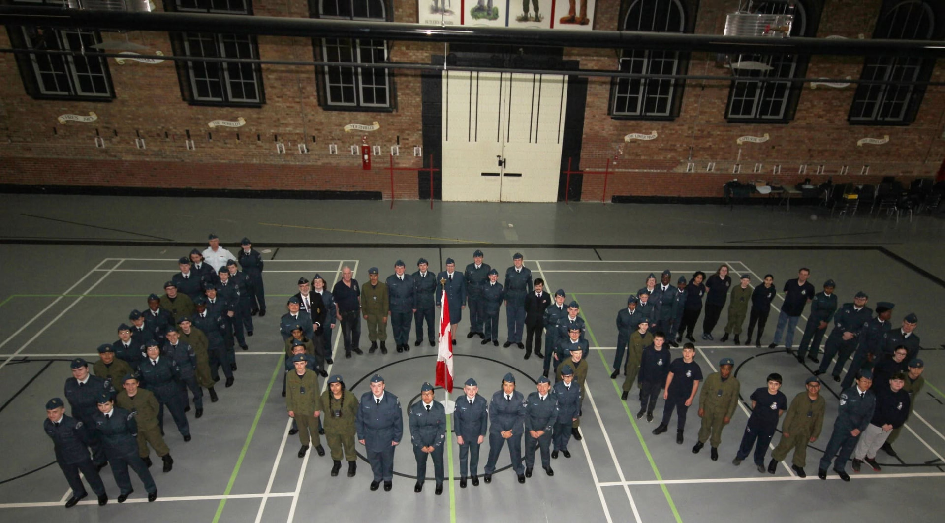 23 Squadron cadets and staff in formation in the parade square